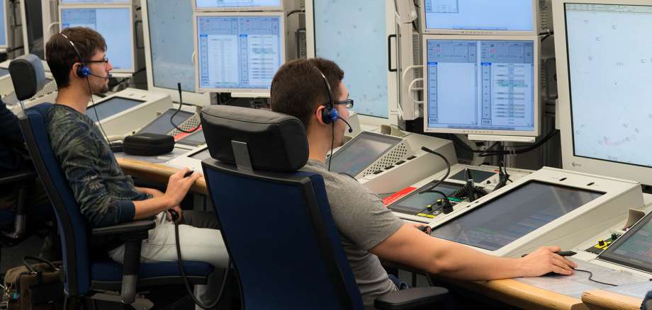 Air traffic controllers at their workplace in the control centre