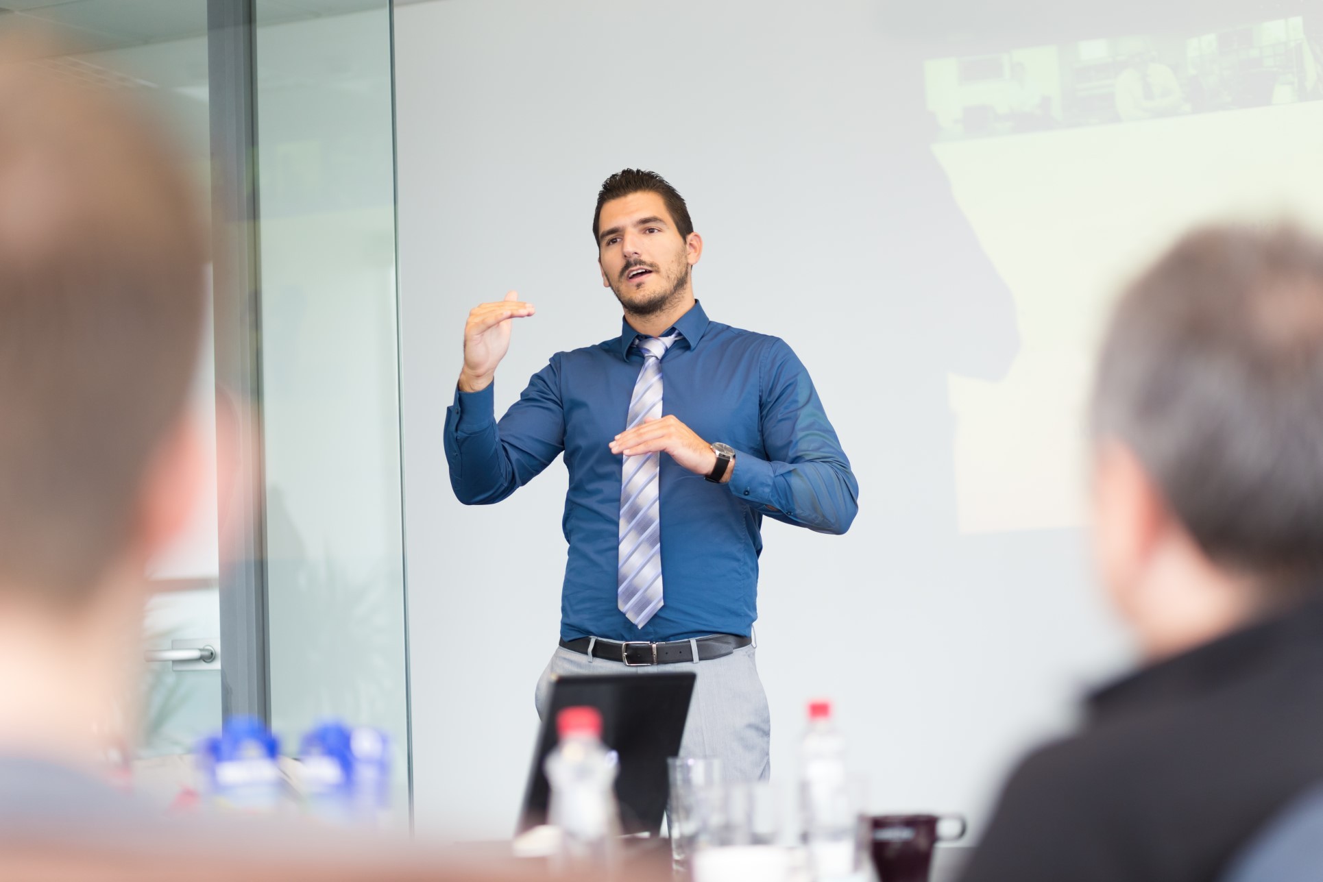 business man presenting in meeting room