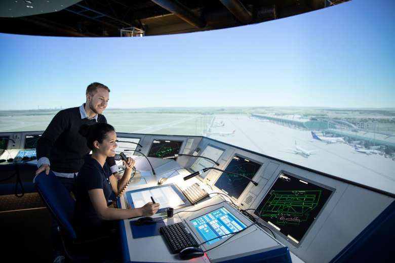 Two air traffic controller trainees in the 360° tower simulator Two air traffic controller trainees in the 360° tower simulator